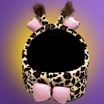 Cute cow-patterned pet bed with pink bows and ears.